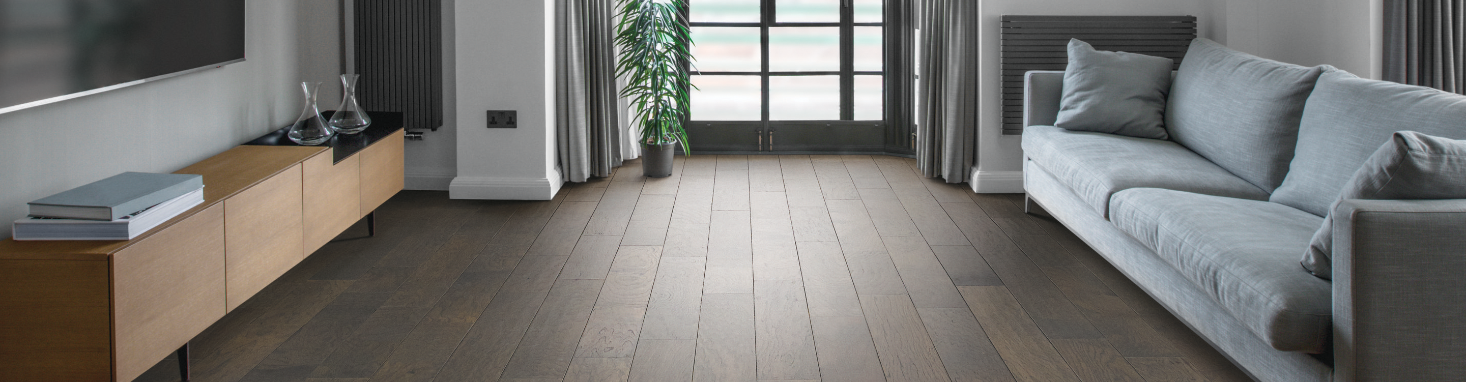 Dark hardwood floor in modern living room. 